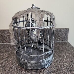 Spooky Village Animated Talking Skeleton Zombie Parrot in Cage Halloween Motion
